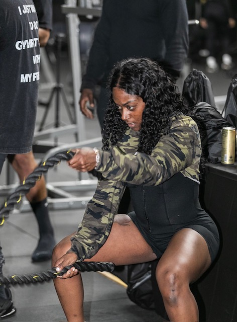 BFE athlete training with battle ropes at Thrive Fitness